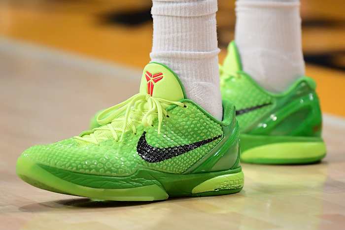 Los Angeles Lakers guard Kobe Bryant's green and red Nike sneakers.